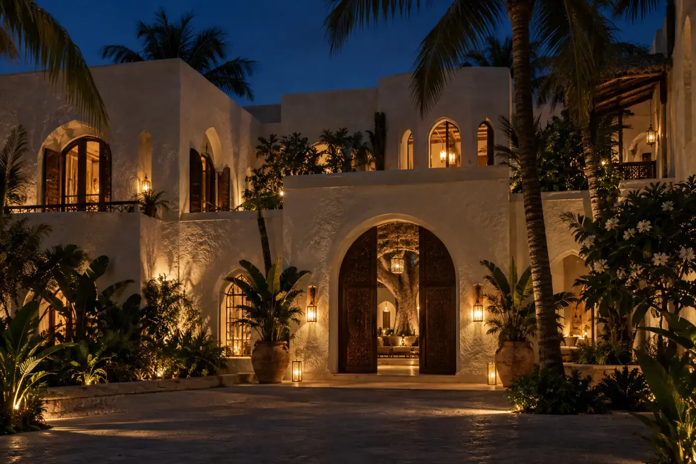 The house and garden illuminated at night